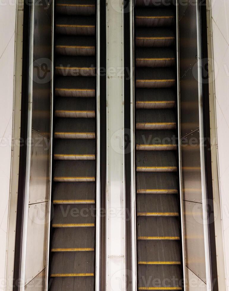 Top view of two escalators photo