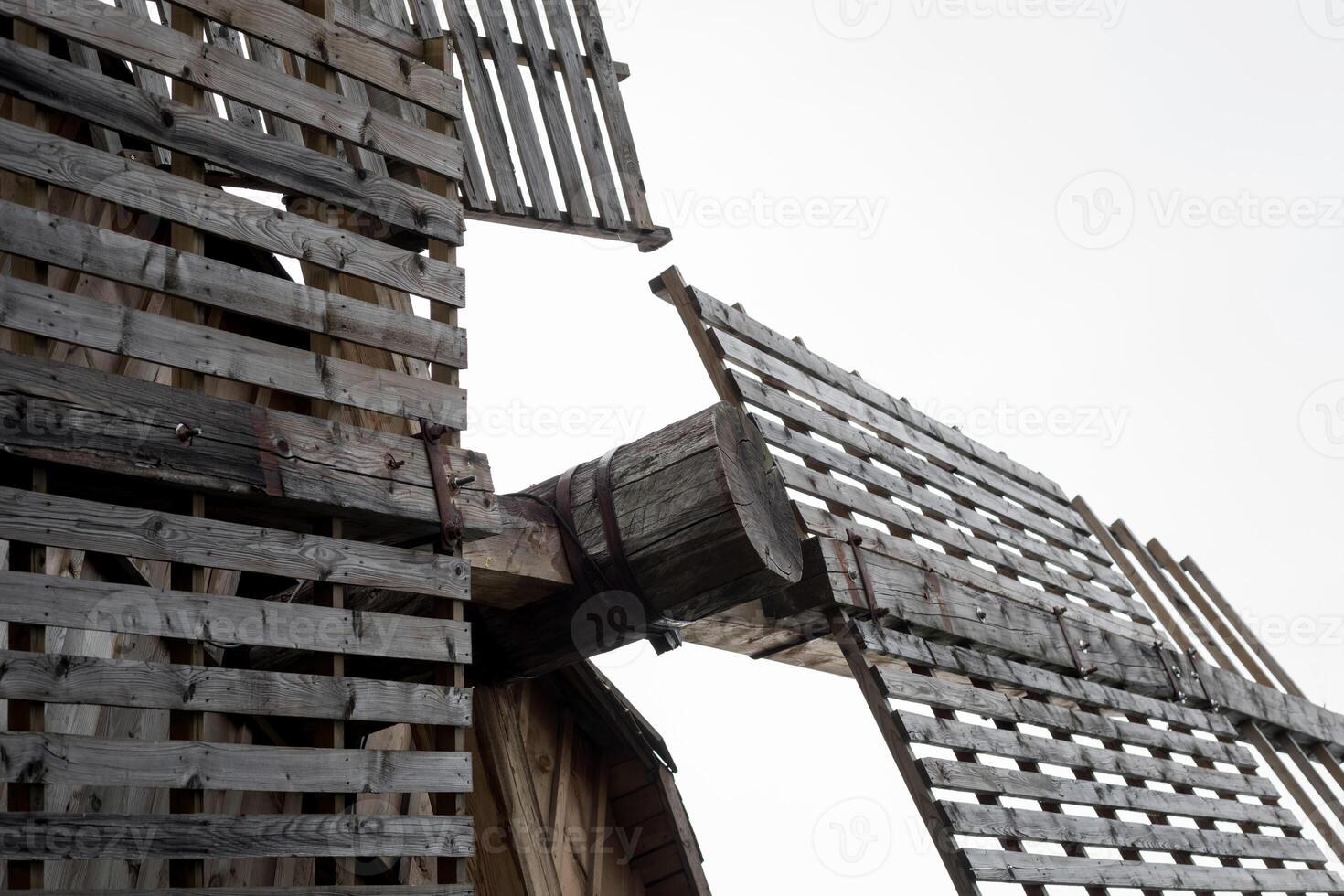 Old wooden mill in the village. photo