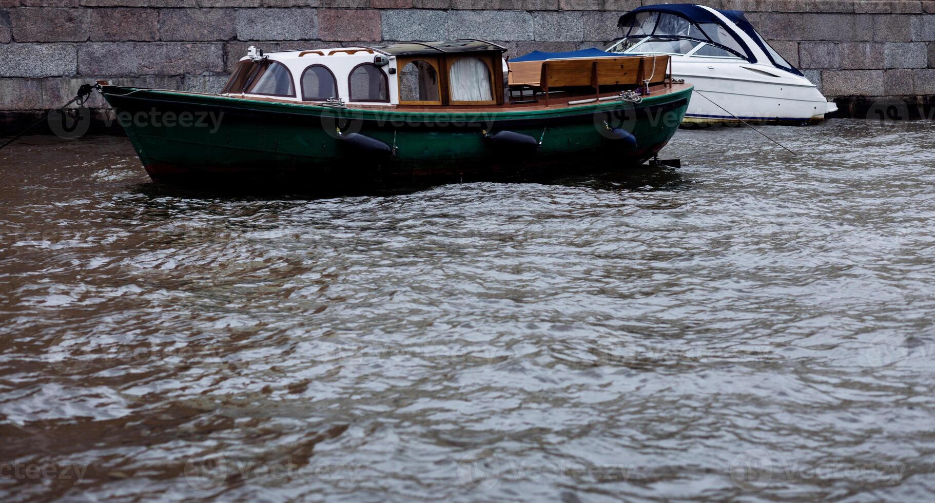 Canal boats in city photo