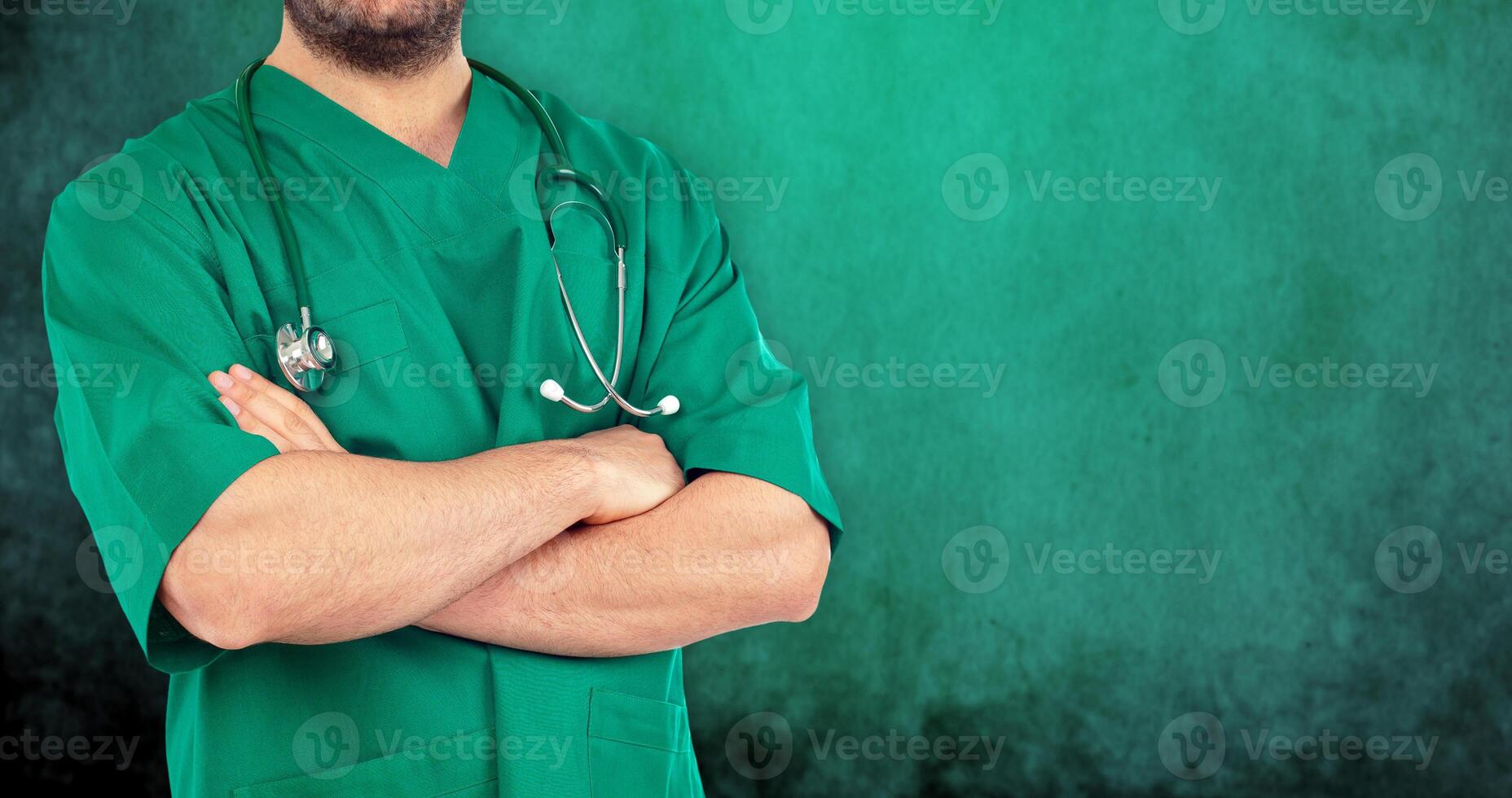 Close up of a doctor with his arms crossed photo