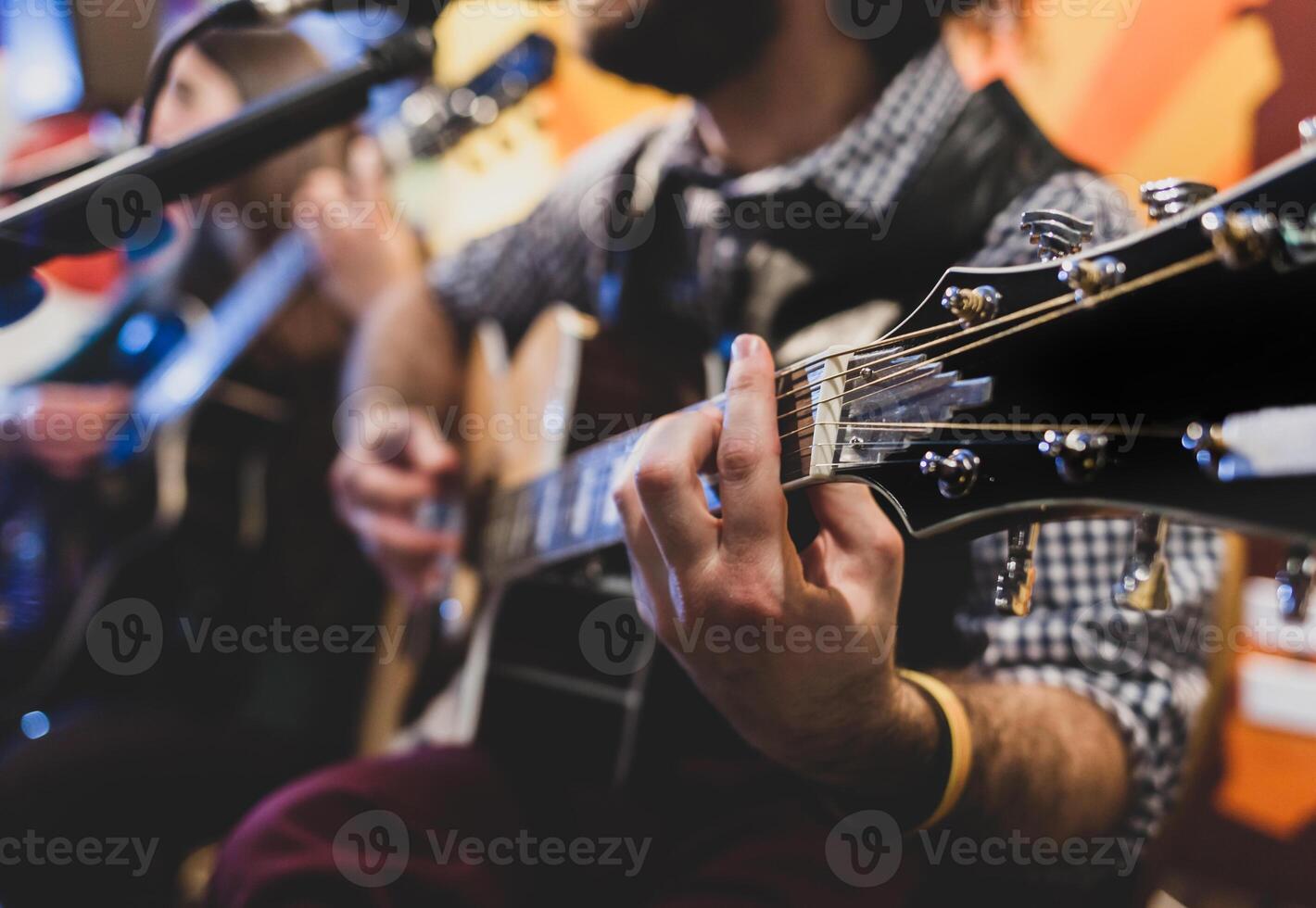 Playing classic guitar. Selective focus. photo