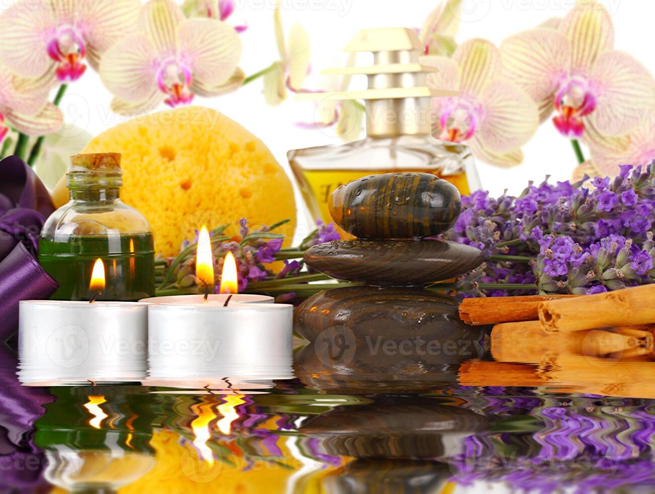 Accessories for spa with orchids, lavender, stones, candles and cinnamon photo