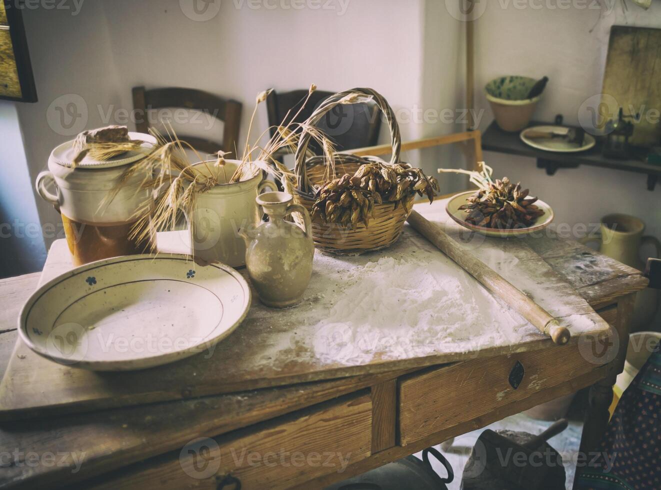 Table with ingredients and kitchen tools. photo