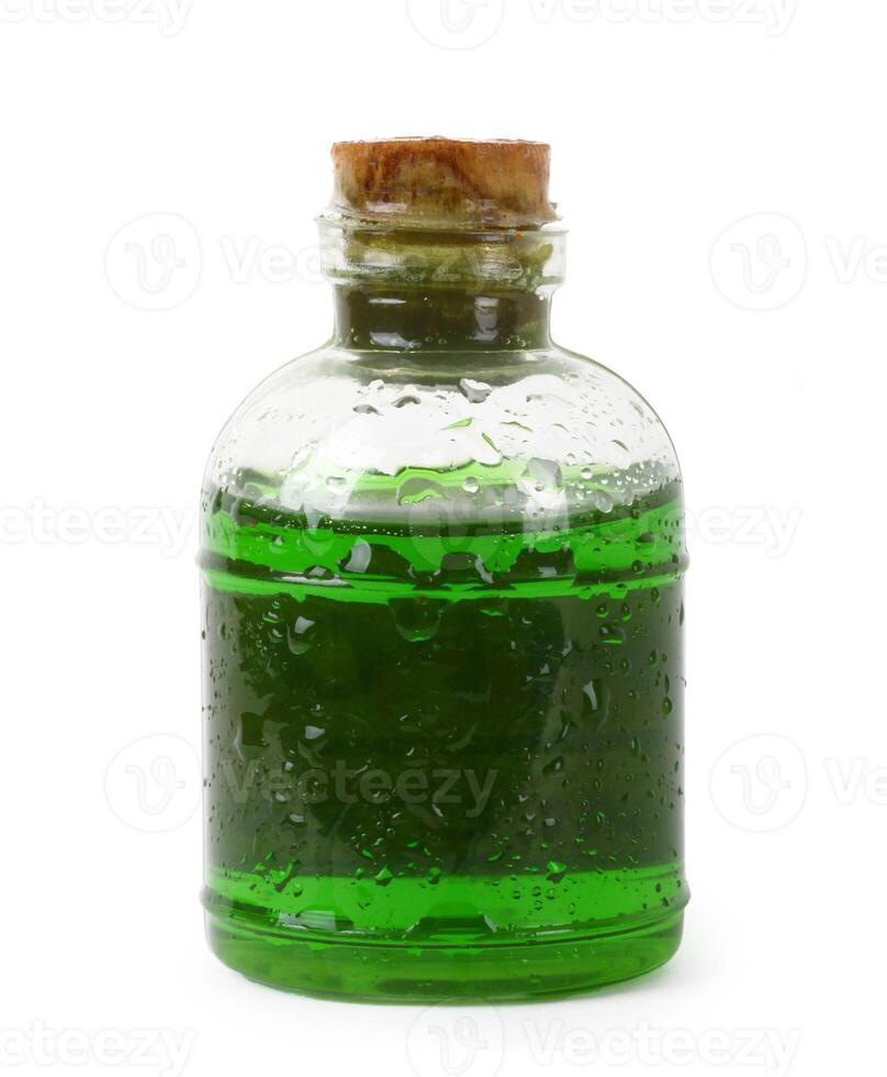 Bottle of green liquid photo