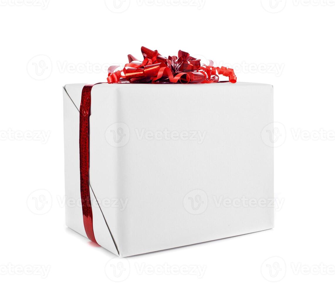 Gift box with red ribbon for Christmas. photo