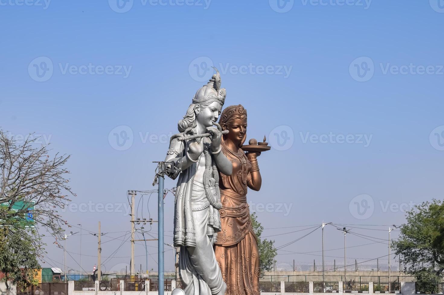 Big statue of Lord Radha Krishna near Delhi International airport, Delhi, India, Lord Krishna and Radha big statue touching sky at main highway Mahipalpur, Delhi photo
