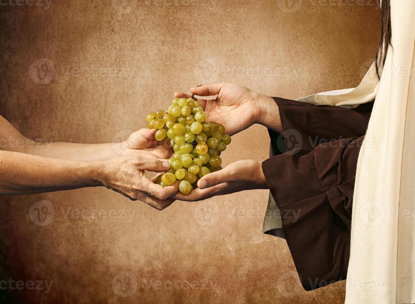 Jesus gives grapes to a beggar photo