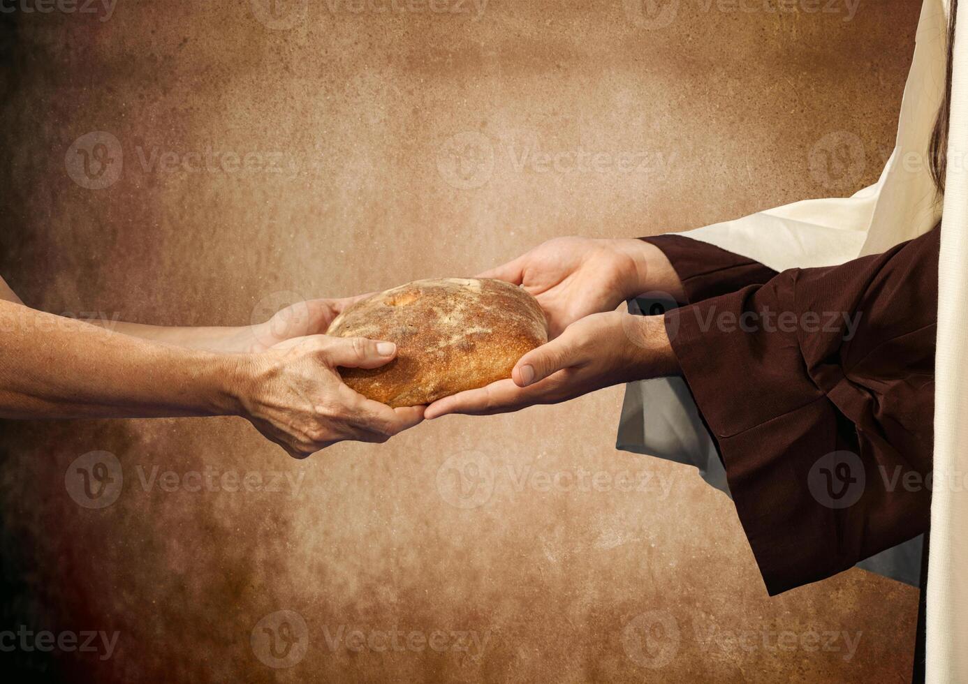 Jesus gives the bread to a beggar. photo