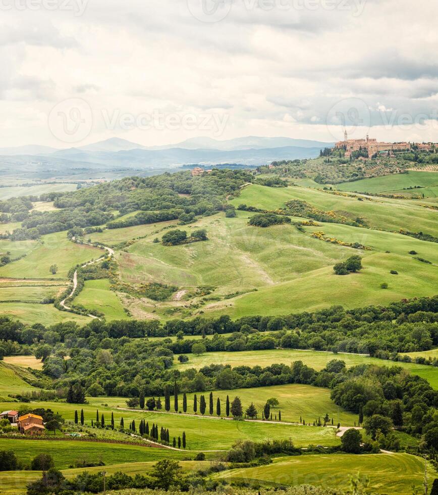 View of the town of Pienza with the typical Tuscan hills photo