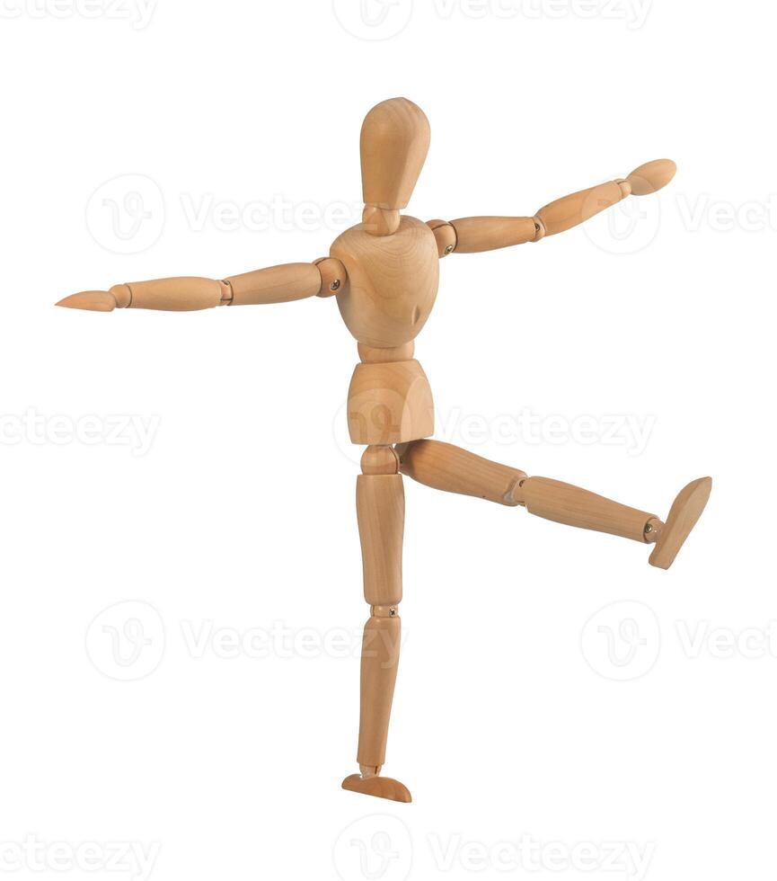 Wooden dummy in the balance photo