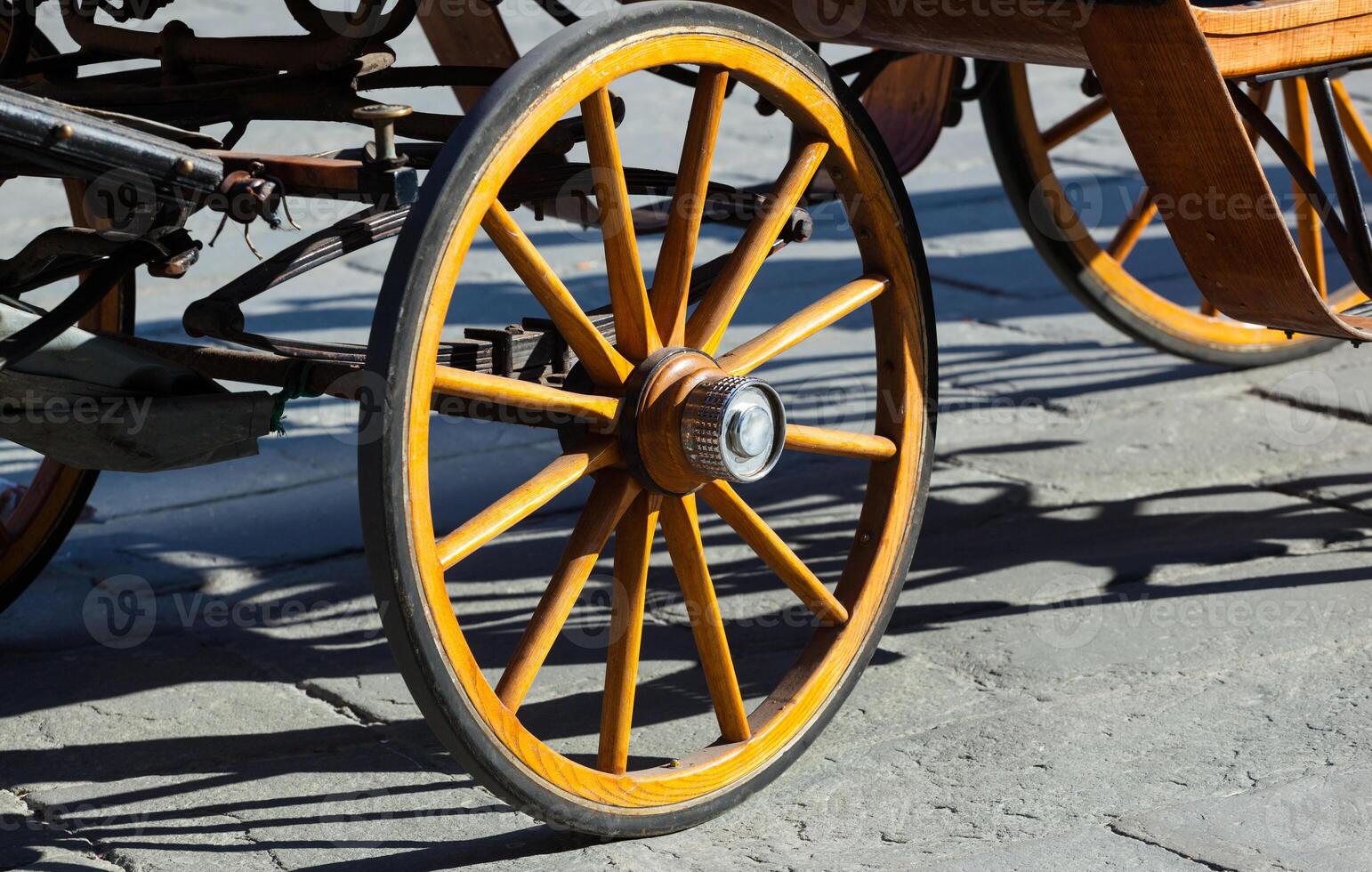 Yellow wheel olden horse carriage photo