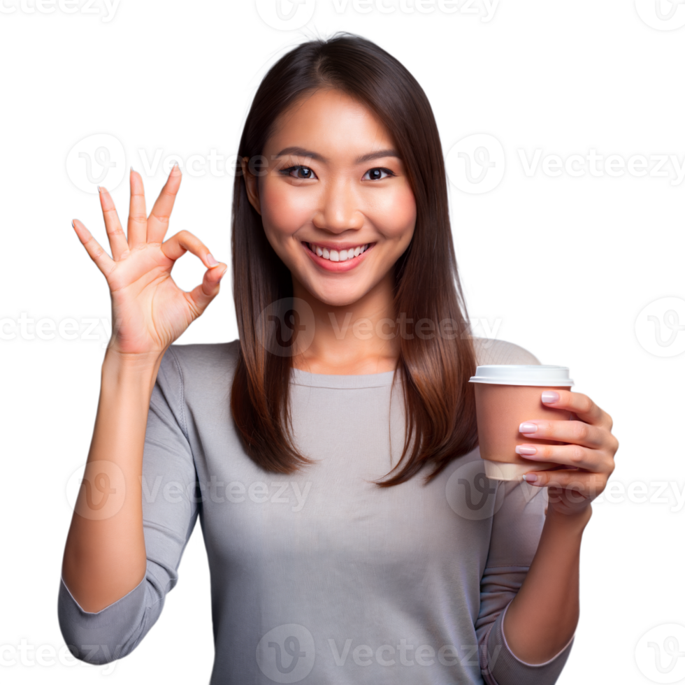 Smiling Young Asian Woman Gesturing Okay While Holding a Takeaway Coffee Cup png