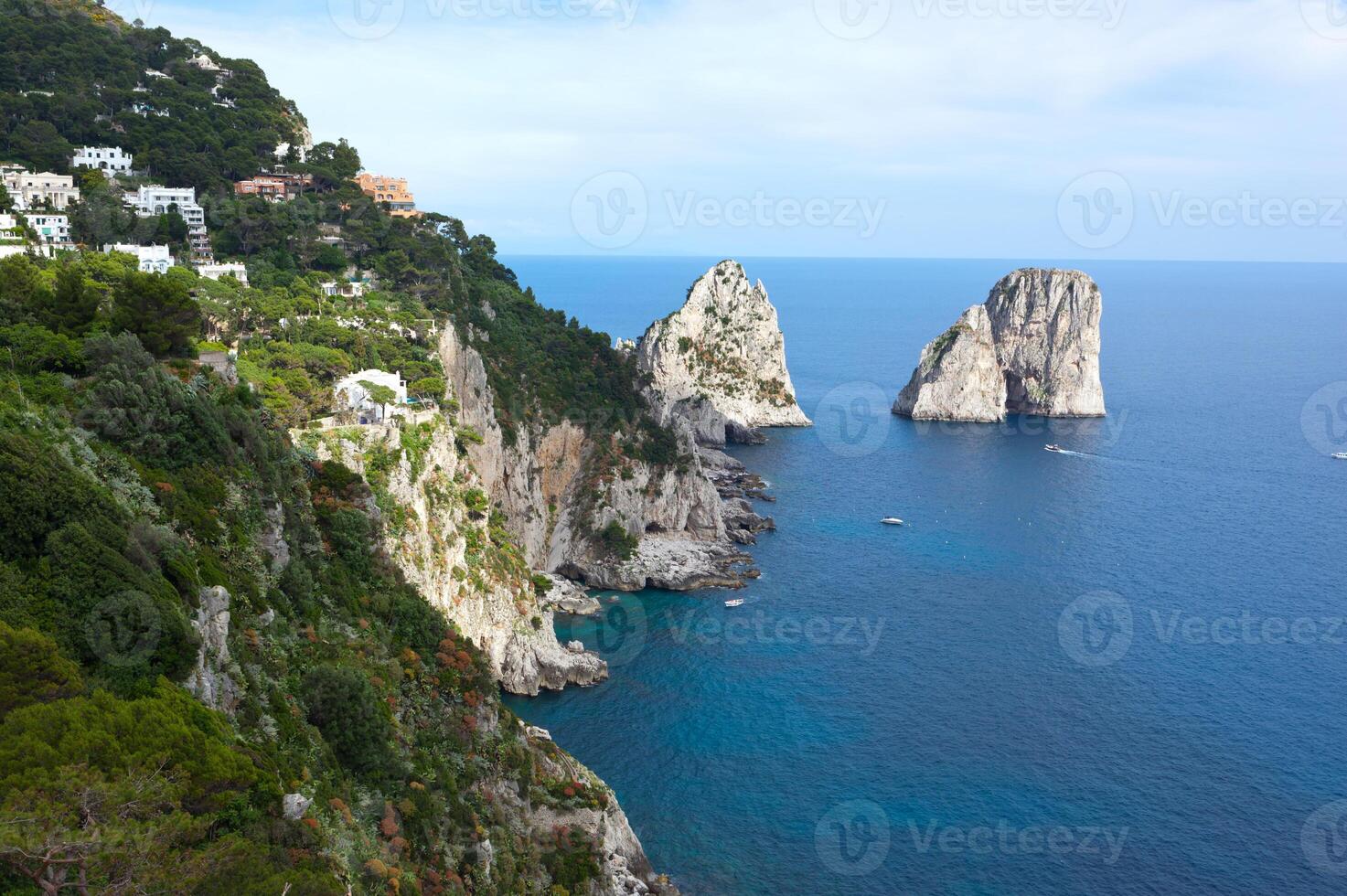 Faraglioni, famous giant rocks, Capri island photo