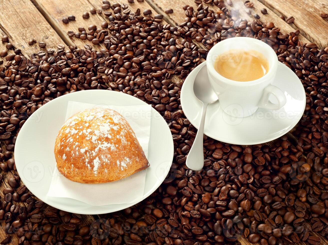 Neapolitan Sfogliatella frolla with espresso photo