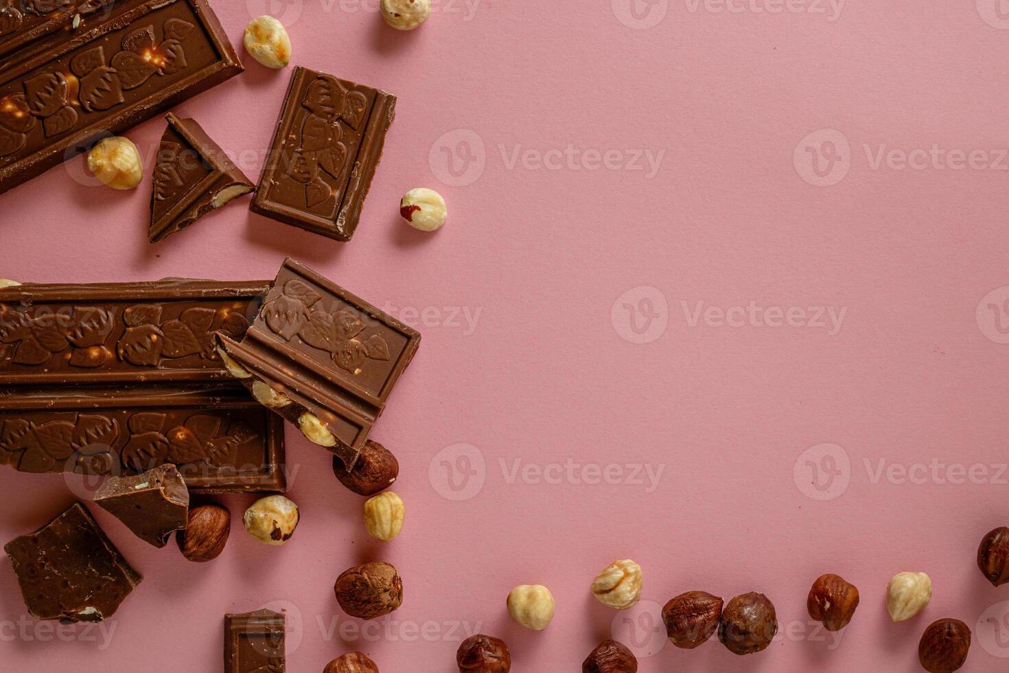Chocolate bar pieces. Background with chocolate. Sweet food photo concept.