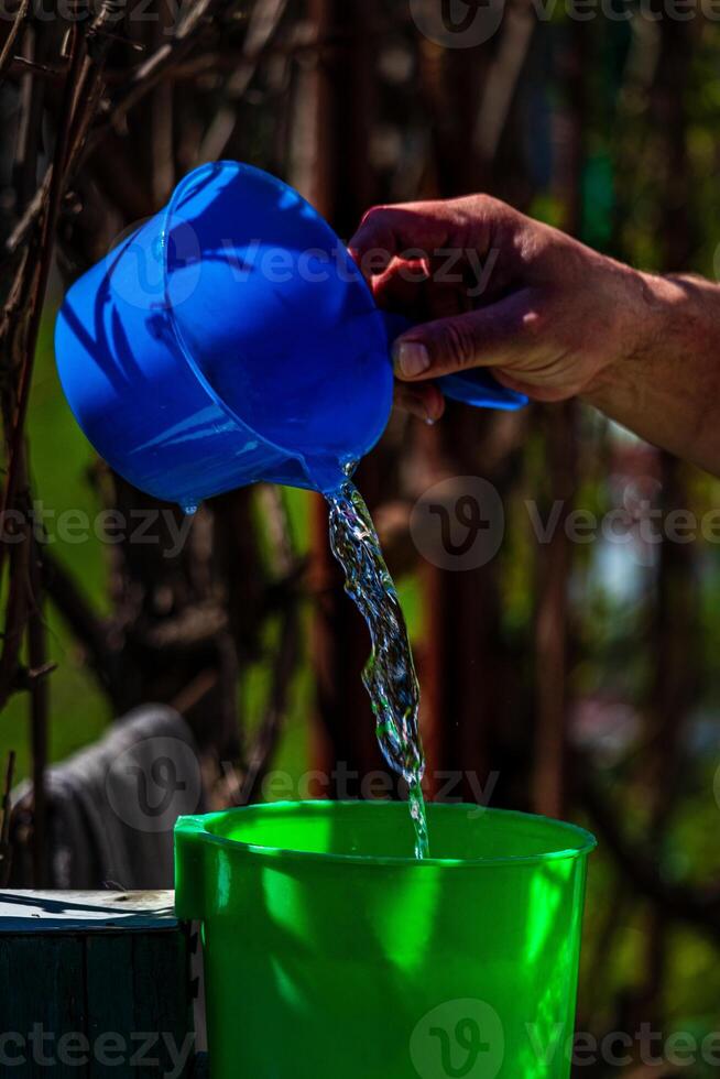 Green washbasin in the yard. Hand wash basin. photo