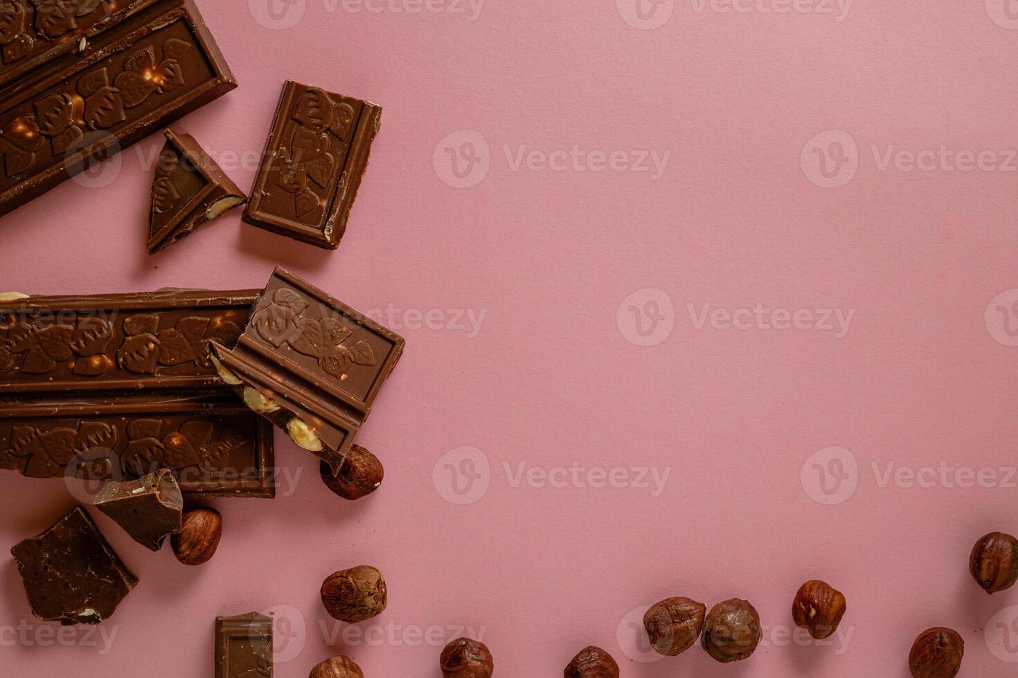 Chocolate bar pieces. Background with chocolate. Sweet food photo concept.