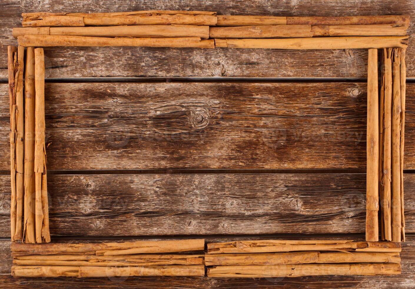 Frame with sticks of ceylon cinnamon photo