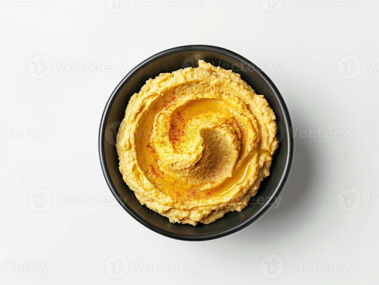 A bowl of hummus isolated on white background. Middle eastern cuisine photo