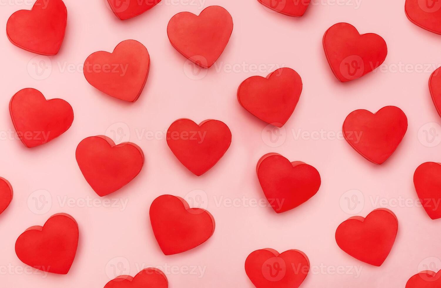 Flat view of valentines hearts on pink background photo