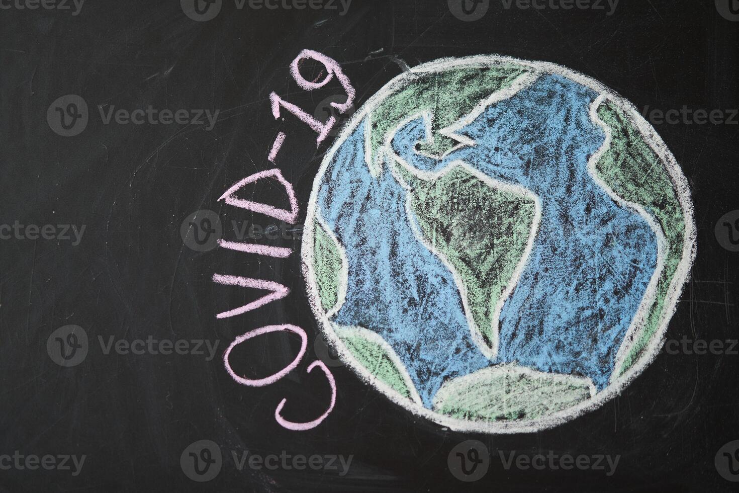 inscription stay at home. Outbreak Warning. written white chalk on blackboard in connection with epidemic of coronavirus worldwide. photo