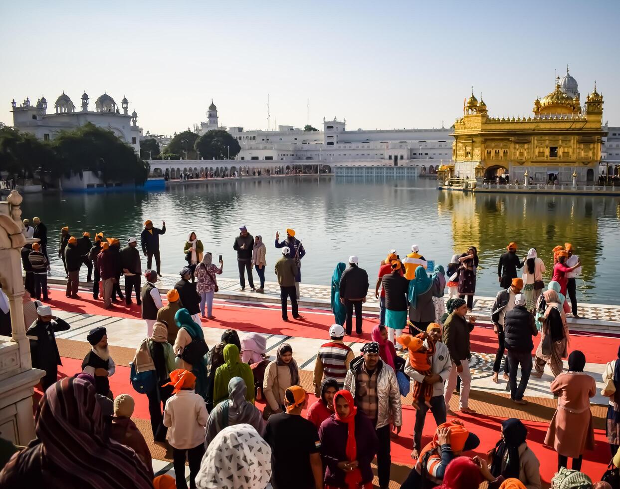Amritsar, India - February 26 2024 -Unidentified devotees from various parts at Golden Temple - Harmandir Sahib in Amritsar, Punjab, India, Famous indian sikh landmark, Golden Temple photo