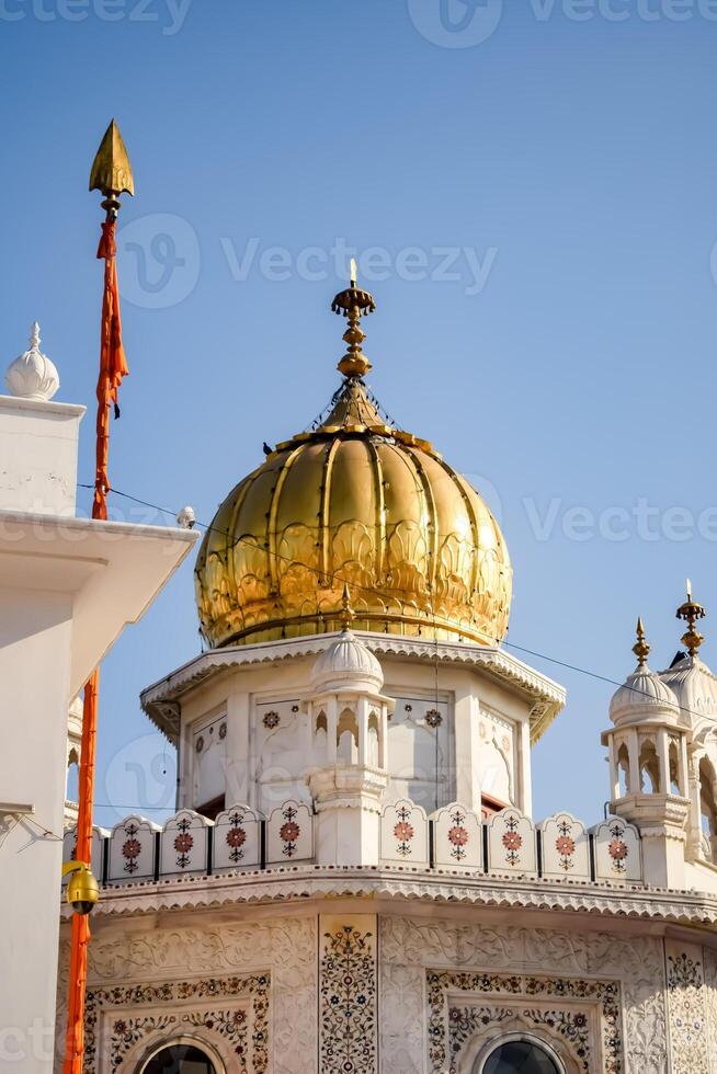 View of details of architecture inside Golden Temple - Harmandir Sahib in Amritsar, Punjab, India, Famous indian sikh landmark, Golden Temple, the main sanctuary of Sikhs in Amritsar, India photo