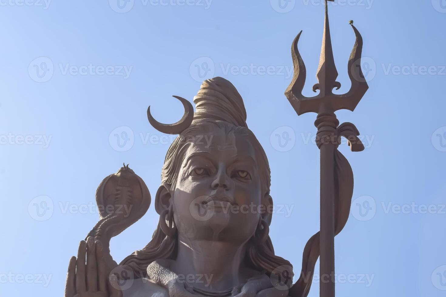 Big statue of Lord Shiva near Delhi International airport, Delhi, India, Lord Shiv big statue touching sky at main highway Mahipalpur, Delhi photo