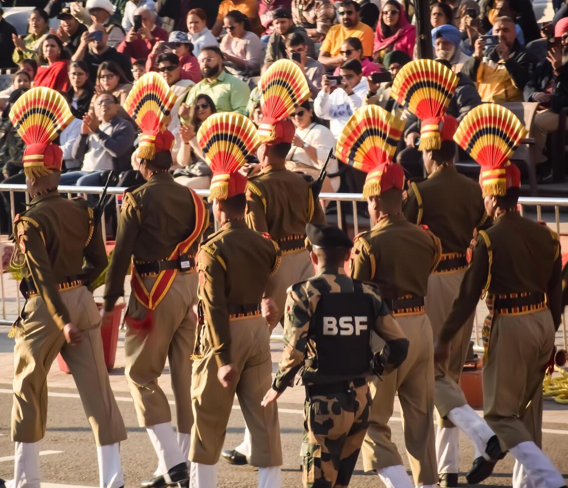 Wagah Border, Amritsar, Punjab, India, 02 February 2024 - Flag ceremony by Border Security Force BSF guards at India-Pakistan border near Attari Amritsar, Punjab, India held every day evening time photo