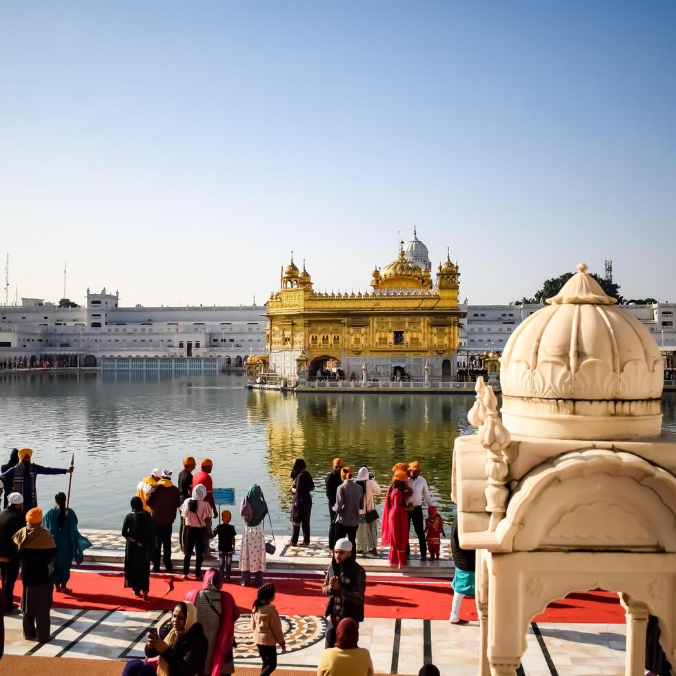 Amritsar, India - February 26 2024 -Unidentified devotees from various parts at Golden Temple - Harmandir Sahib in Amritsar, Punjab, India, Famous indian sikh landmark, Golden Temple photo