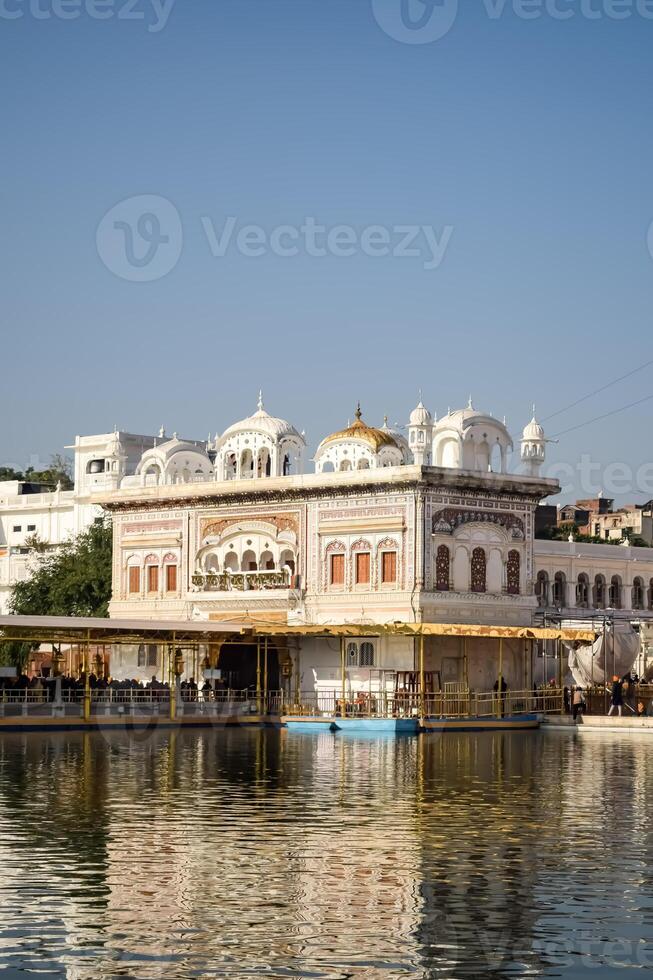 View of details of architecture inside Golden Temple - Harmandir Sahib in Amritsar, Punjab, India, Famous indian sikh landmark, Golden Temple, the main sanctuary of Sikhs in Amritsar, India photo