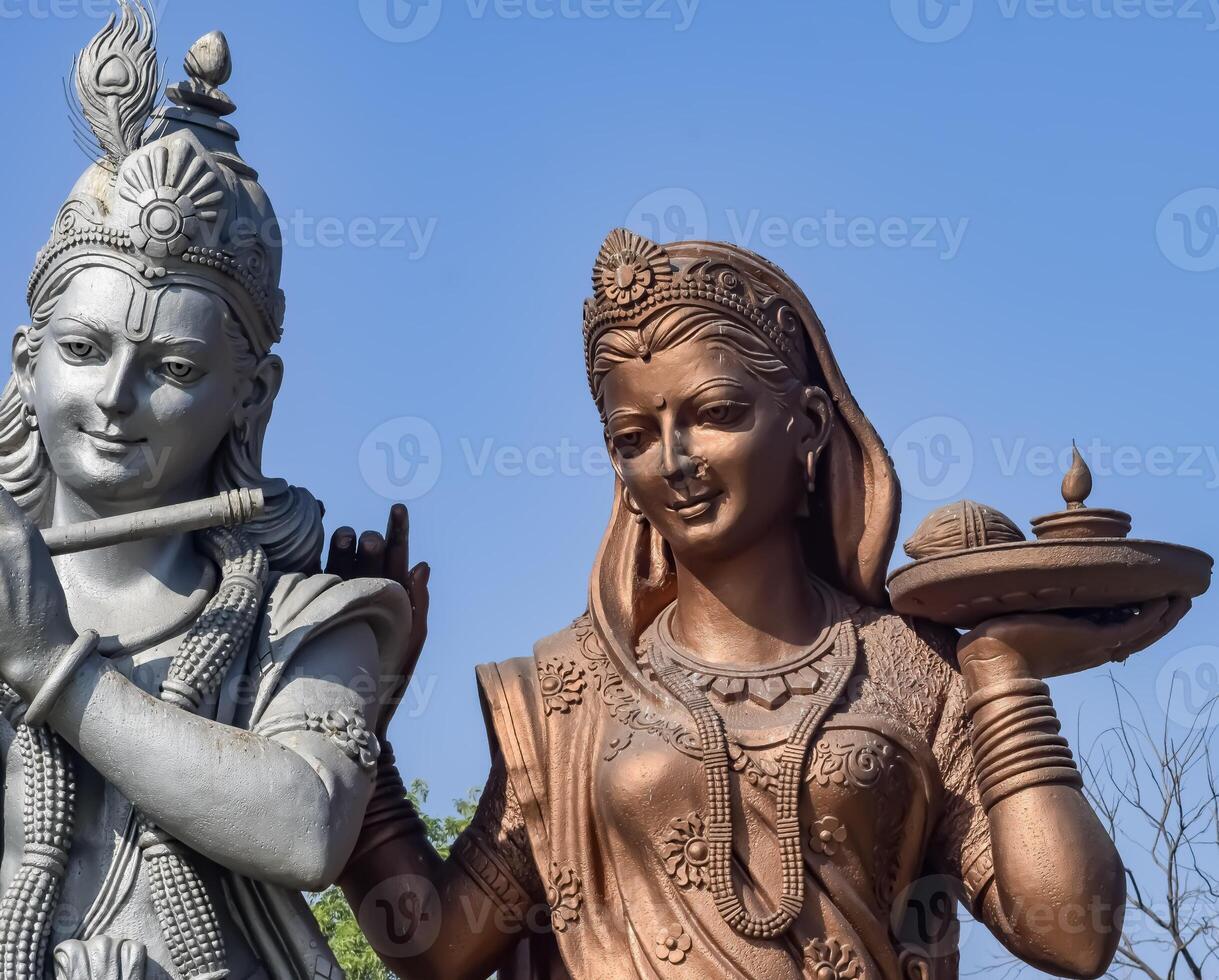 Big statue of Lord Radha Krishna near Delhi International airport, Delhi, India, Lord Krishna and Radha big statue touching sky at main highway Mahipalpur, Delhi photo