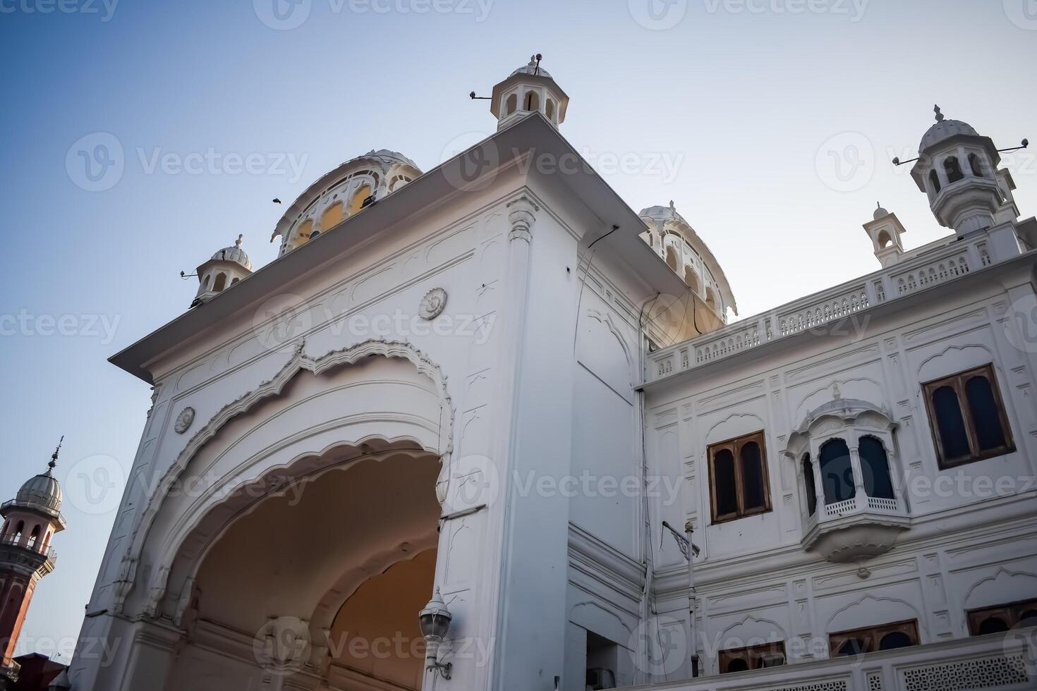 View of details of architecture inside Golden Temple - Harmandir Sahib in Amritsar, Punjab, India, Famous indian sikh landmark, Golden Temple, the main sanctuary of Sikhs in Amritsar, India photo