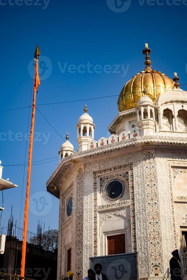 View of details of architecture inside Golden Temple - Harmandir Sahib in Amritsar, Punjab, India, Famous indian sikh landmark, Golden Temple, the main sanctuary of Sikhs in Amritsar, India photo