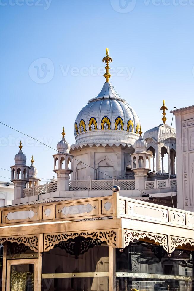 View of details of architecture inside Golden Temple - Harmandir Sahib in Amritsar, Punjab, India, Famous indian sikh landmark, Golden Temple, the main sanctuary of Sikhs in Amritsar, India photo