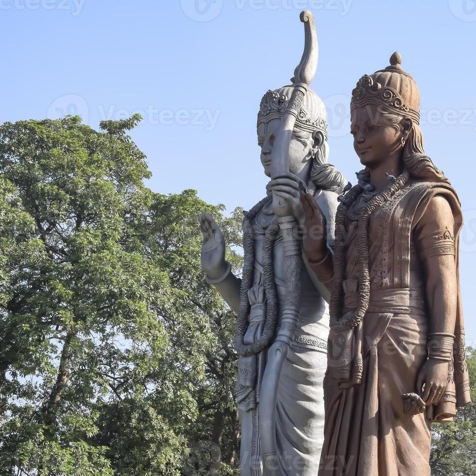 Big statue of Lord Sita Ram near Delhi International airport, Delhi, India, Lord Ram and Sita big statue touching sky at main highway Mahipalpur, Delhi photo