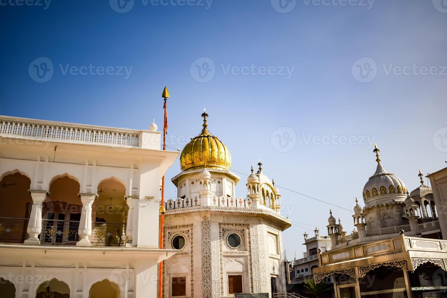 View of details of architecture inside Golden Temple - Harmandir Sahib in Amritsar, Punjab, India, Famous indian sikh landmark, Golden Temple, the main sanctuary of Sikhs in Amritsar, India photo