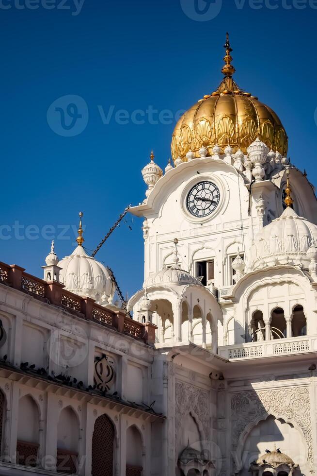 View of details of architecture inside Golden Temple - Harmandir Sahib in Amritsar, Punjab, India, Famous indian sikh landmark, Golden Temple, the main sanctuary of Sikhs in Amritsar, India photo