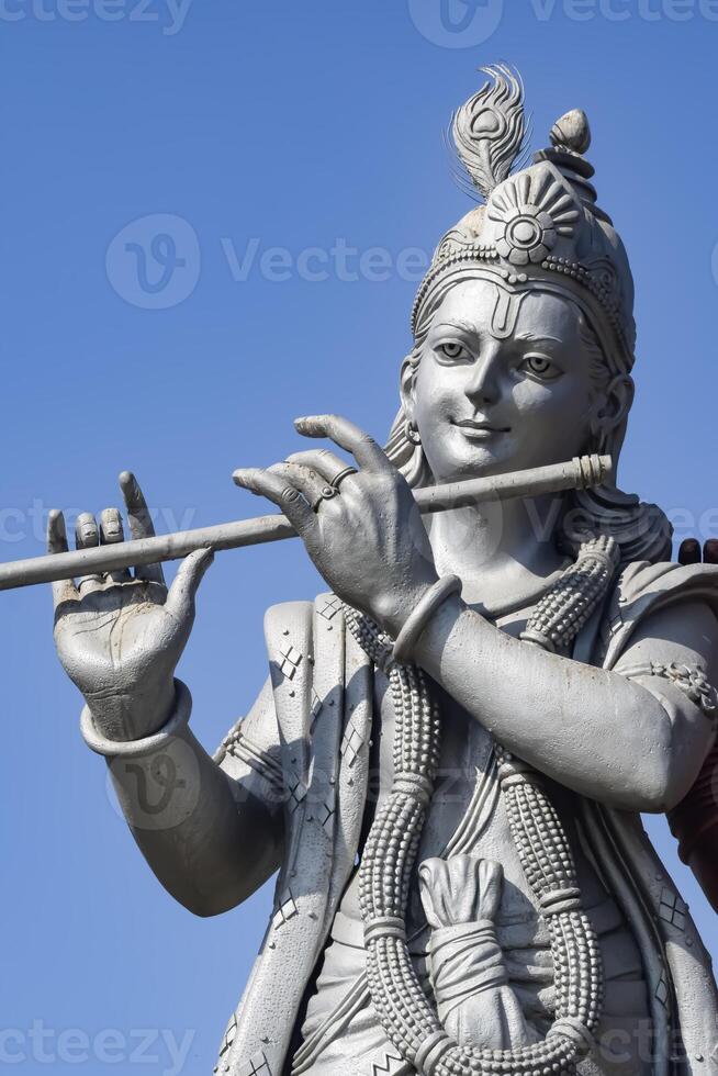 Big statue of Lord Radha Krishna near Delhi International airport, Delhi, India, Lord Krishna and Radha big statue touching sky at main highway Mahipalpur, Delhi photo