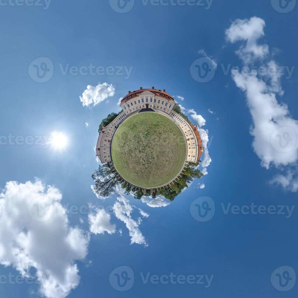 little planet and spherical aerial 360 panorama view on street ancient medieval castle with church and historic buildings with columns photo