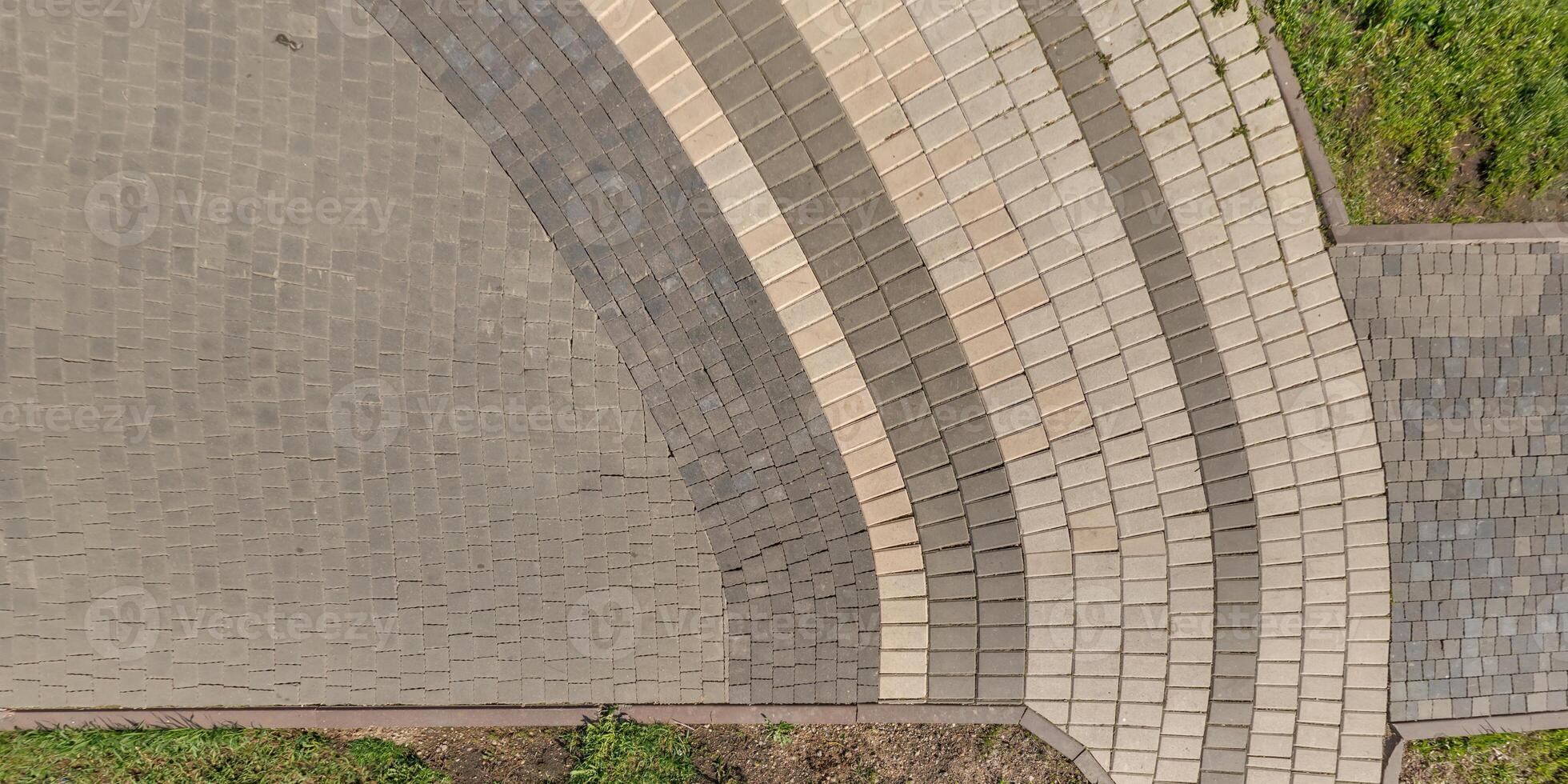 top view of the texture of paving slabs on pedestrian path photo