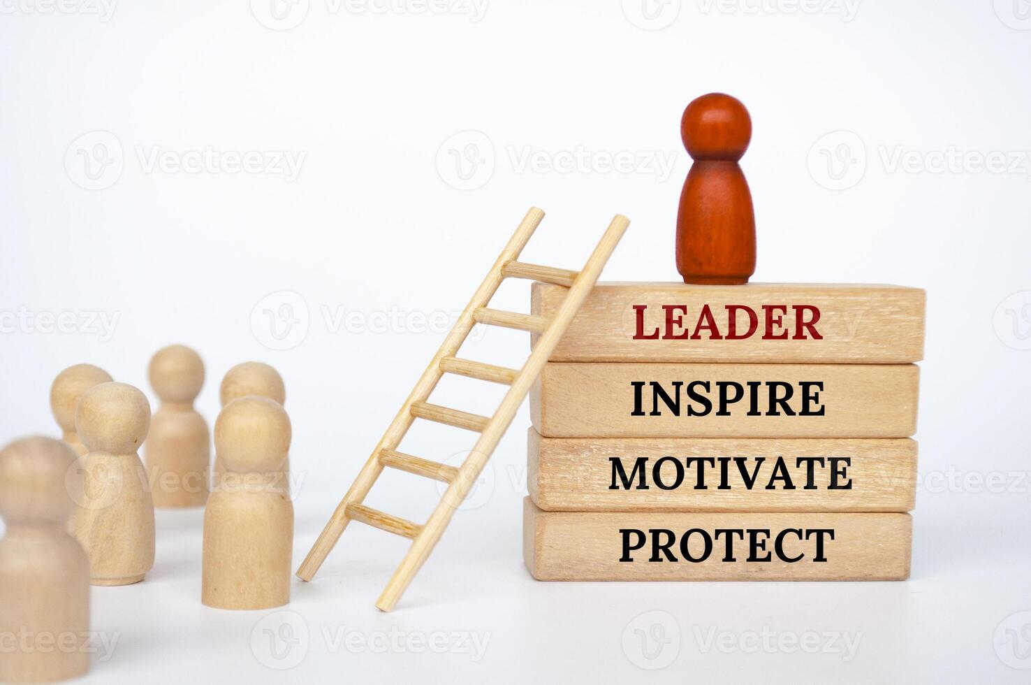 Leader that inspire, motivate and protect text on wooden blocks. Leadership concept photo