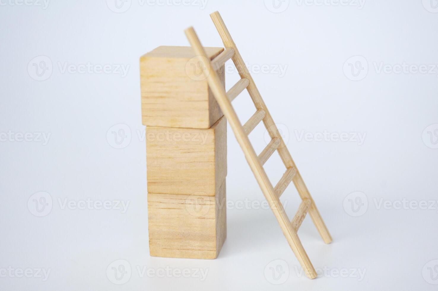 Wooden cubes with ladder on white background with customizable space for text. photo