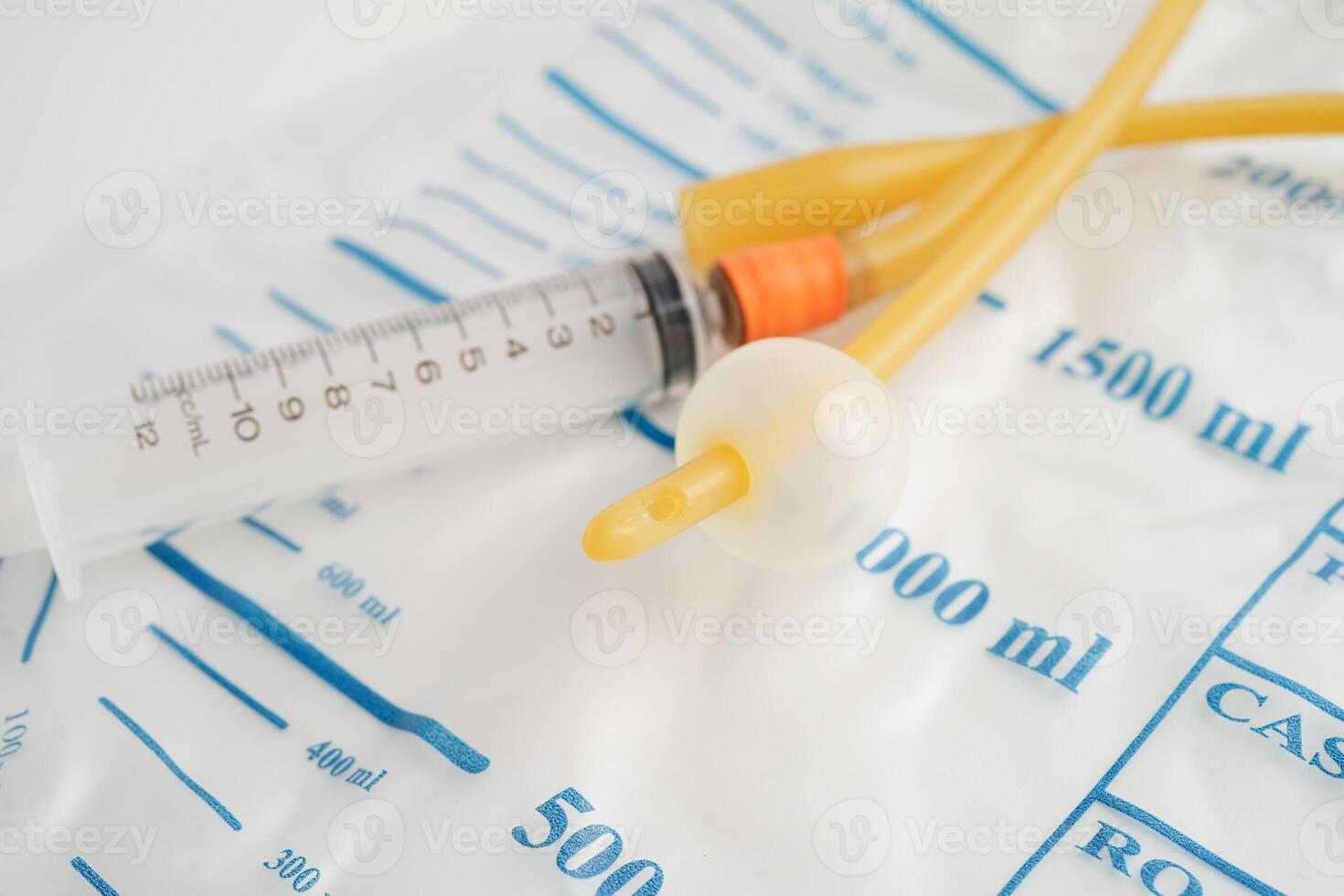 Foley catheter and urine drainage bag collect urine for disability or patient in hospital. photo