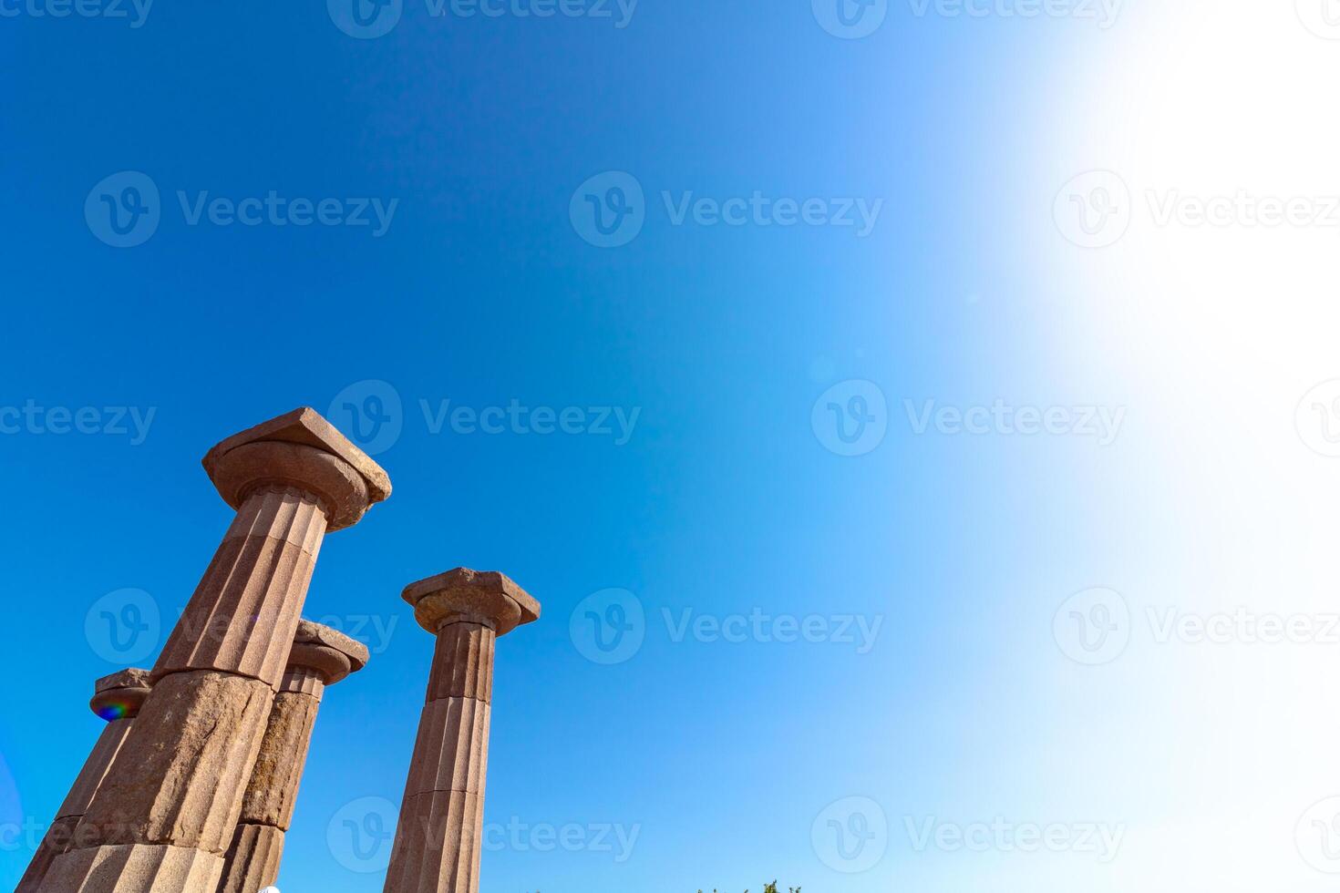 Columns of Temple of Athena in Assos ancient city with copy space for text photo