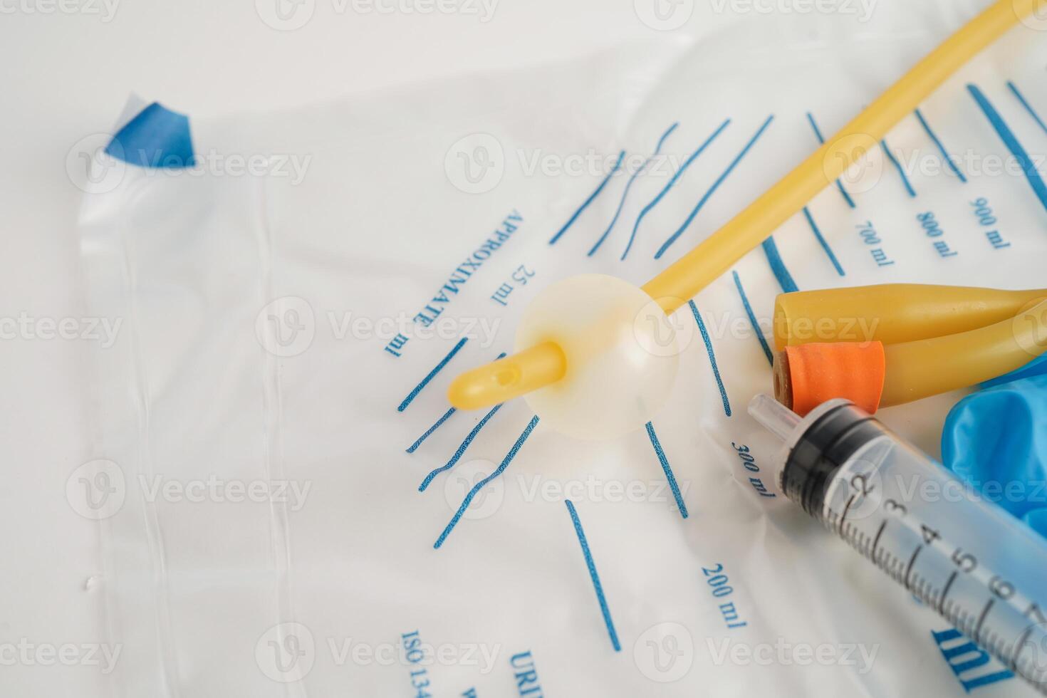 Foley catheter and urine drainage bag collect urine for disability or patient in hospital. photo