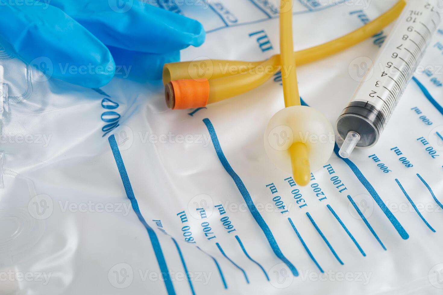 Foley catheter and urine drainage bag collect urine for disability or patient in hospital. photo