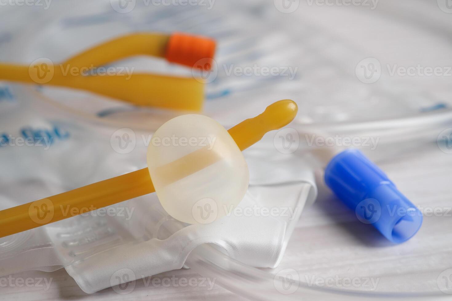 Foley catheter and urine drainage bag collect urine for disability or patient in hospital. photo