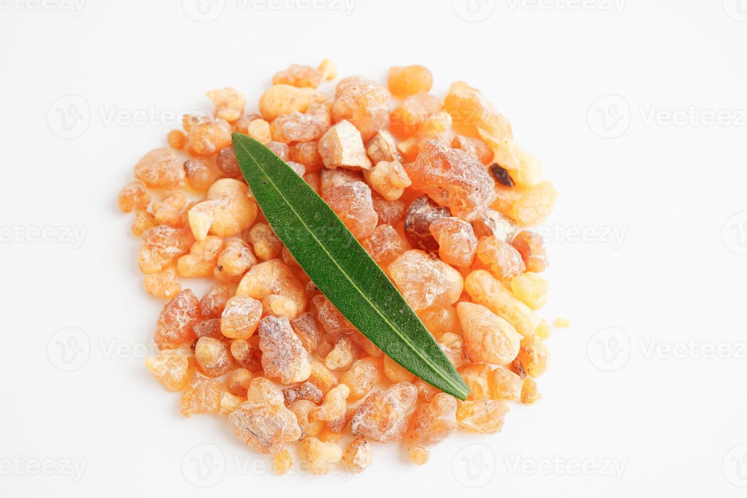 Frankincense or olibanum aromatic resin isolated on white background used in incense and perfumes. photo