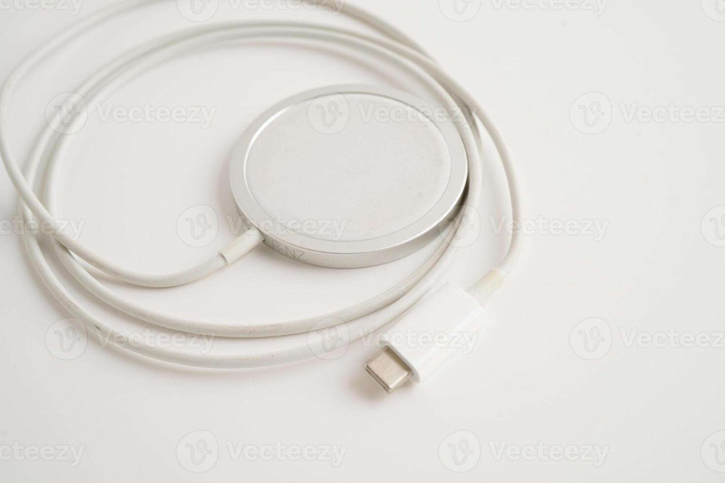 Wireless charger, magnetic charging modern equipment of mobile phone. photo